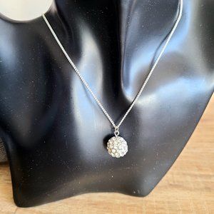 Clear rhinestones crystal ball on chain.